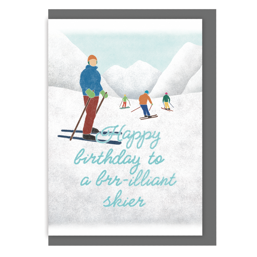 Birthday card with an illustration of skiers in a snowy landscape and the text 'Happy birthday to a brr-illiant skier', against a white background