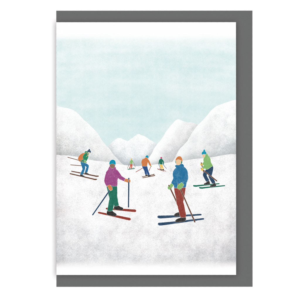 Greetings card with an illustration of skiers in front of snowy mountains, on a white background