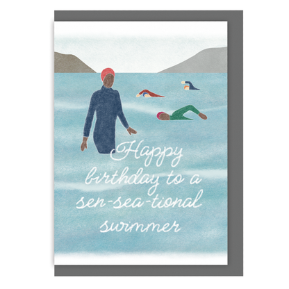 Birthday card with an illustration of people swimming in the ocean and the text 'Happy birthday to a sen-sea-tional swimmer'.