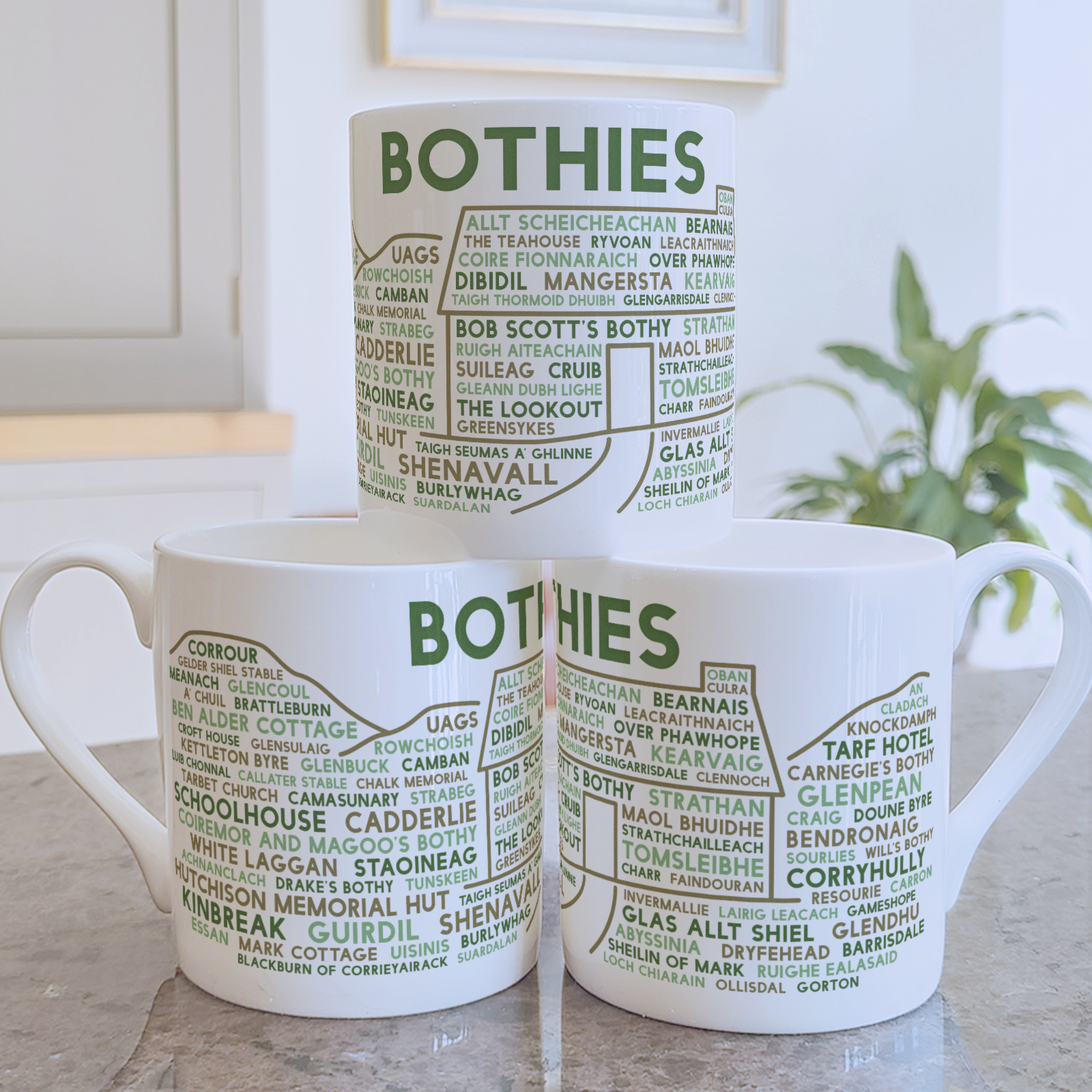 Three Scottish bothies mugs in a stack