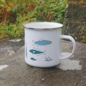 Fishing enamel cup outdoors