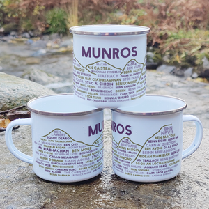 Stack of Munros enamel mugs outdoors