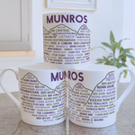 Munros mugs stacked in a kitchen